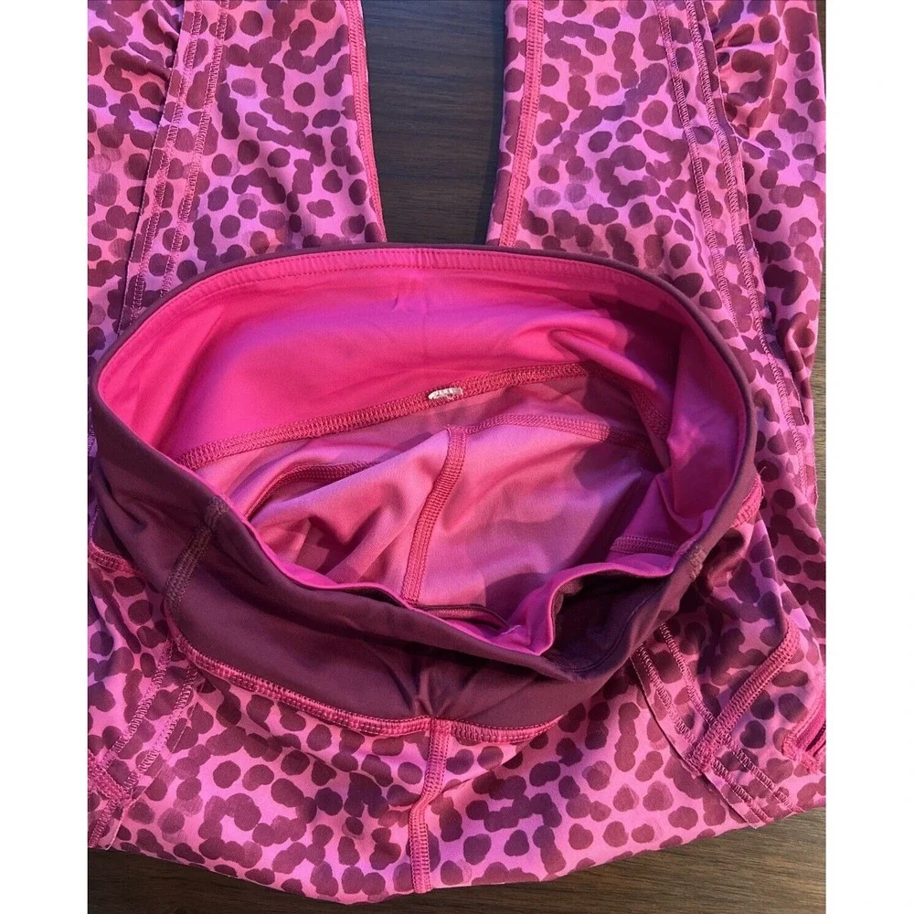Women's Lululemon Sz 4 Speed Crop Legging animal print Magenta Purple Pocket